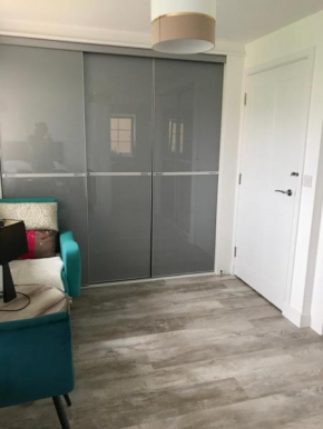 Two bedrooms with 3 double beds 2 bathrooms